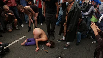 Outdoor bondage and extreme public exposure